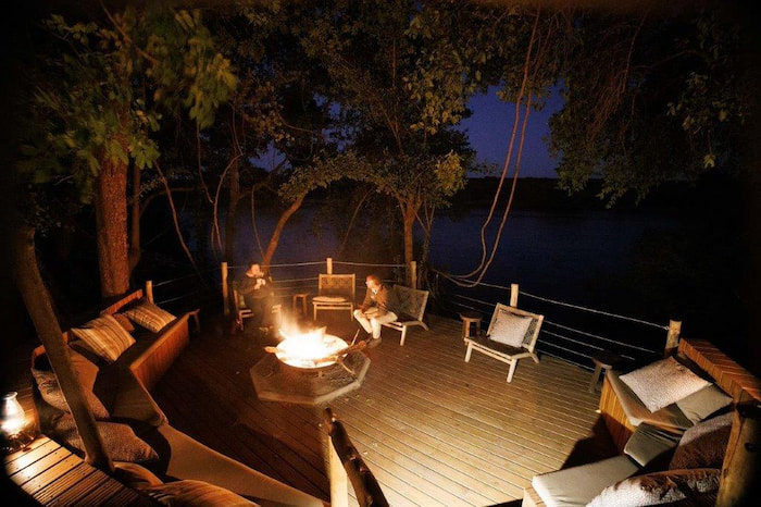 Sitting at firepit Tsowa Africa