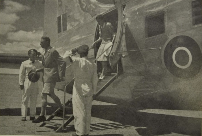 photograph of King George descending the Royal Aeroplane 