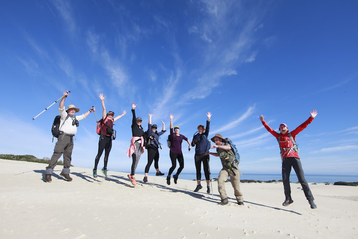 Diversity Trail South Africa dune section hikers celebrating