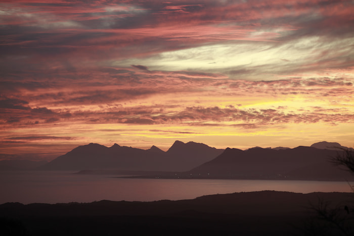 Diversity Trail vivid sunset with a view of table mountain and cape point