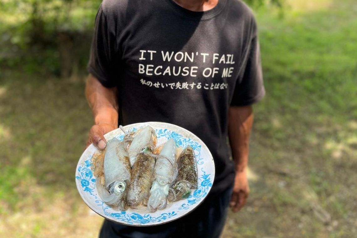 A slogan on the chest of a salesman.