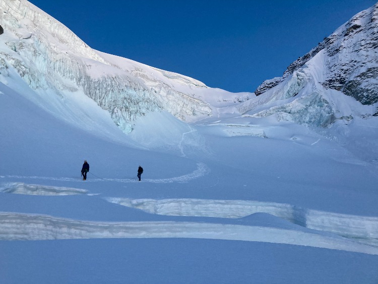 Matthew and Fiona descending from the summit to get back to base camp.