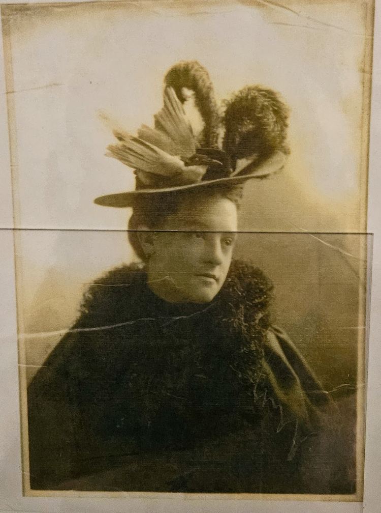 Photograph of a woman in the late 1800s wearing a hat decorated with puffin and other bird feathers;, Rockland photo in Puffin Project office