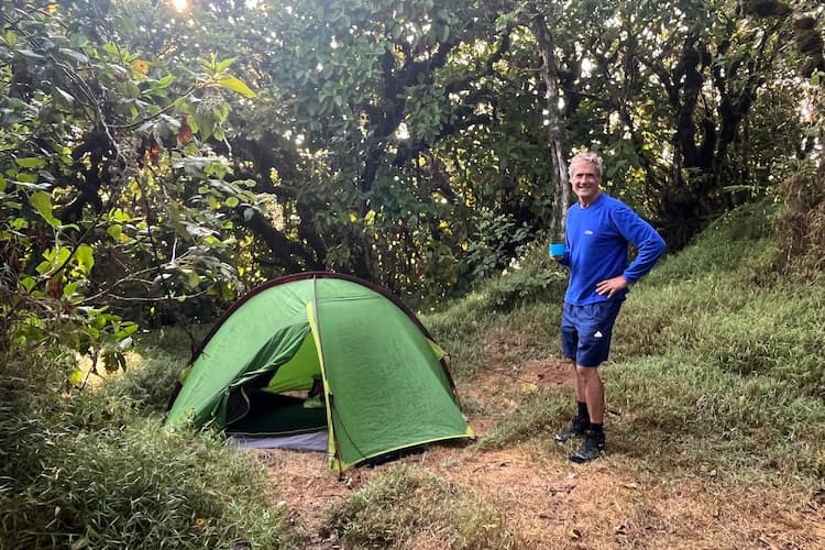 Setting up a tent after a difficult walk through the rainforest